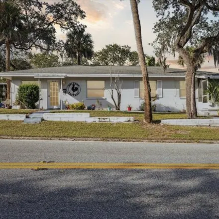 Buy this 4 bed house on 624 Aurora Road in Melbourne, FL 32935