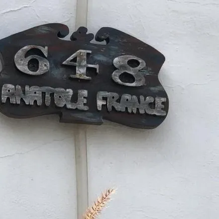 Buy this 4 bed house on Anatole France 632 in Partido de Lomas de Zamora, 1835 Temperley