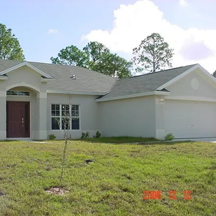Buy this 3 bed house on 565 White Plains Avenue Southwest in Palm Bay, FL 32908