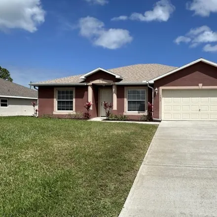 Buy this 3 bed house on 1459 Goyer Road Southeast in Palm Bay, FL 32909