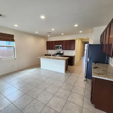 Rent this 4 bed apartment on East Ryscott Circle in Pima County, AZ