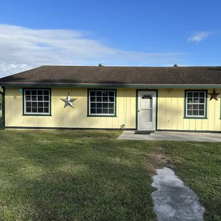Rent this 3 bed house on 14151 Tripp Road North in Loxahatchee Groves, FL 33470
