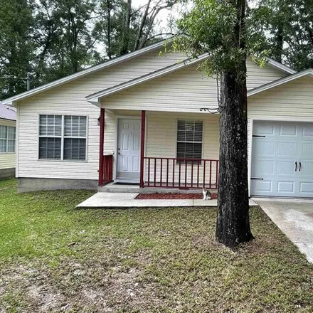 Buy this 4 bed house on 5998 Orchid Seed Lane in Leon County, FL 32305
