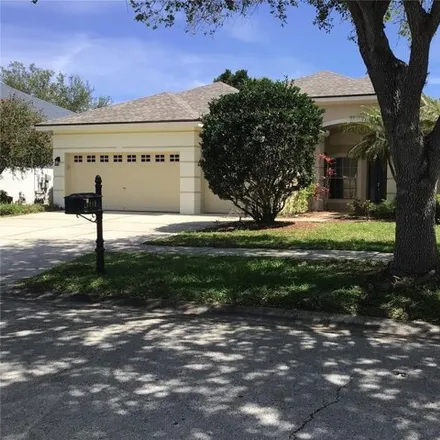 Rent this 4 bed house on 10409 Snowden Place in Westchase, Hillsborough County