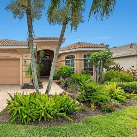 Rent this 3 bed house on 8827 Largo Mar Drive in Belle Lago, Lee County