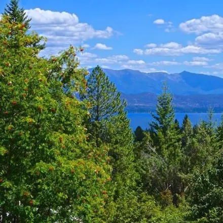 Buy this 4 bed house on 66 Timber Lake Drive in Flathead County, MT 59922