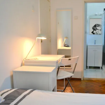 Rent this 5 bed room on Avenida Infante Santo 53 in 1350-179 Lisbon, Portugal