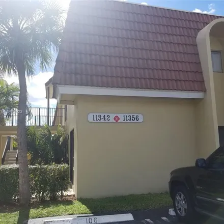 Rent this 2 bed apartment on 11349 Royal Palm Boulevard in Coral Springs, FL 33065