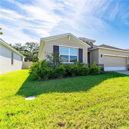 Buy this 4 bed house on Wheat Stone Drive in Zephyrhills, FL 33542