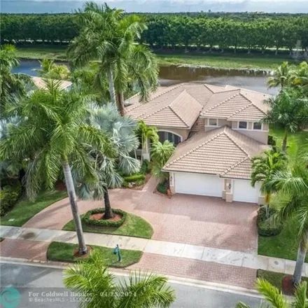 Rent this 5 bed house on 1428 Victoria Isle Drive in Weston, FL 33327