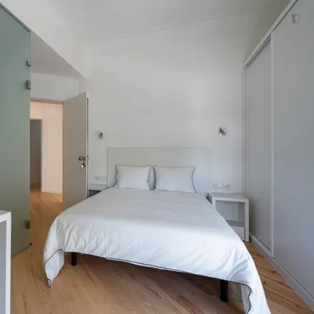 Rent this 7 bed room on Avenida Praia da Vitória 77 in 1050-120 Lisbon, Portugal