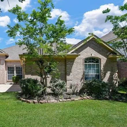 Rent this 4 bed house on 10206 Hahns Peak Drive in Stone Gate, Harris County