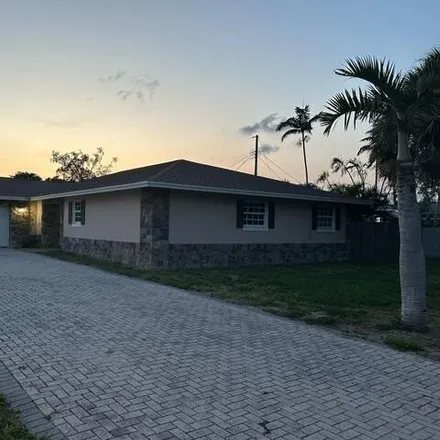 Rent this 4 bed house on 4631 Grove Street in Lake Worth Beach, FL 33461