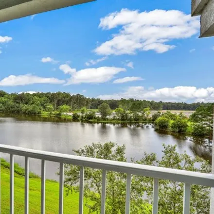 Rent this 3 bed condo on 4908 Key Lime Drive in Jacksonville, FL 32256