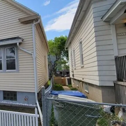 Buy this 3 bed house on 2561 South 13th Street in Milwaukee, WI 53215