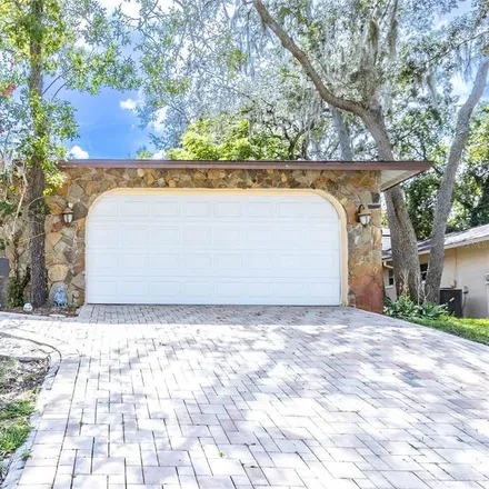 Buy this 3 bed house on 8713 Forest Lake Drive in Jasmine Estates, FL 34668