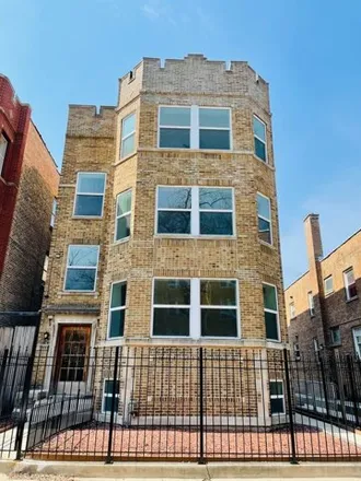 Rent this 3 bed apartment on 7408 N Hoyne Ave Apt 3 in Chicago, Illinois