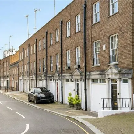 Buy this 3 bed townhouse on 77 Cadogan Lane in London, SW1X 9EJ