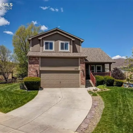 Buy this 4 bed house on 1598 Chutney Court in Colorado Springs, CO 80907