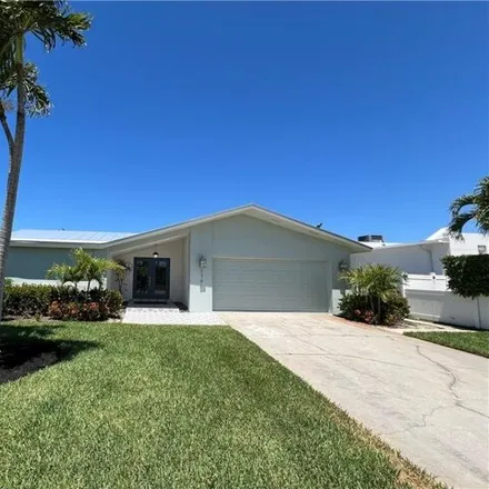 Rent this 3 bed house on 1383 Lake Shore Drive in Collier County, FL 34103