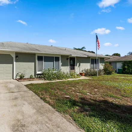 Buy this 3 bed house on 7700 Santana Avenue in Lakewood Park, FL 34951
