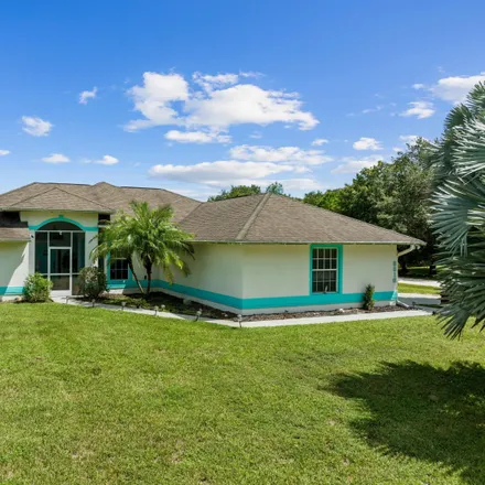 Buy this 3 bed house on 8898 93rd Court in Vero Lake Estates, Indian River County