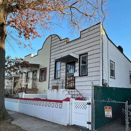 Buy this 4 bed house on 174-48 126th Avenue in New York, NY 11434