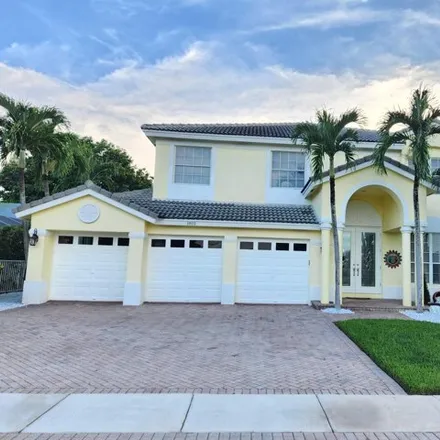 Rent this 5 bed house on 1851 Corsica Drive in Wellington, FL 33414