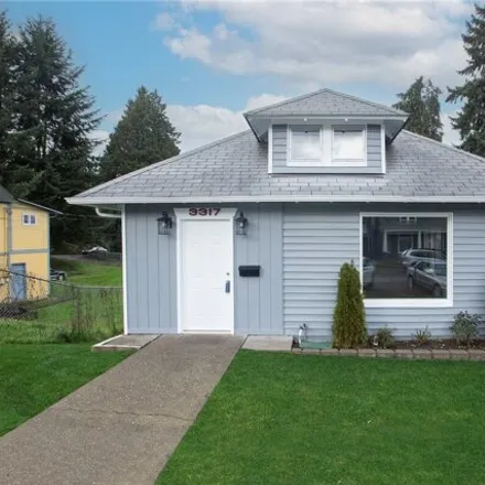 Buy this 4 bed house on 3317 S 8th St in Tacoma, Washington