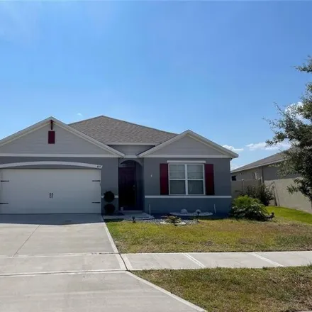 Rent this 4 bed house on 497 Noble Ave in Davenport, Florida