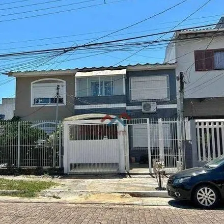 Buy this 3 bed house on Agência de Correios Franqueada Rio Branco Canoas in Avenida Guilherme Schell 1968, Rio Branco