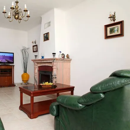 Rent this 4 bed house on 8200-385 Albufeira