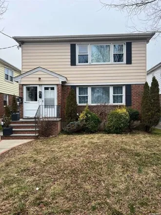 Buy this 5 bed house on 89-40 239th Street in New York, NY 11426
