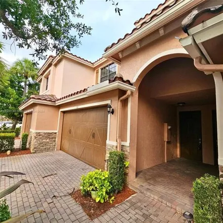 Rent this 3 bed townhouse on 132 E Riverwalk Cir E Unit 132 in Plantation, Florida