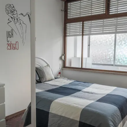 Rent this 5 bed room on Avenida Infante Santo 53 in 1350-179 Lisbon, Portugal