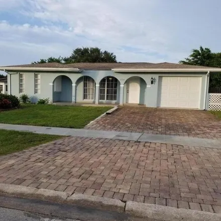 Rent this 3 bed house on 181 Northeast Jardain Road in River Park, Saint Lucie County