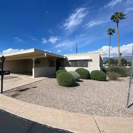 Buy this 2 bed townhouse on 1043 North Caribe Avenue in Tucson, AZ 85710