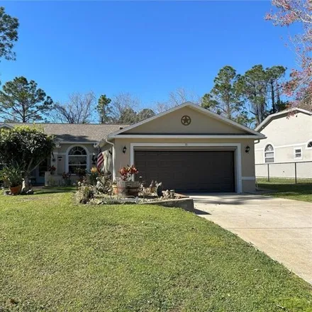 Image 3 - 13 Putter Drive, Palm Coast, FL 32164, USA - House for sale