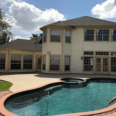 Rent this 4 bed house on 13684 Starlight Harbour Court in Houston, TX 77077