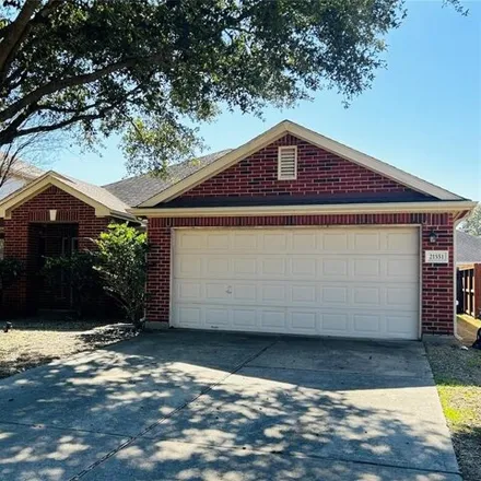 Rent this 3 bed house on 21587 Oak Park Trails Drive in Harris County, TX 77450