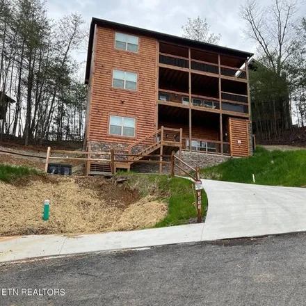 Buy this 6 bed house on 647 Chickasaw Gap Way in Pigeon Forge, TN 37863