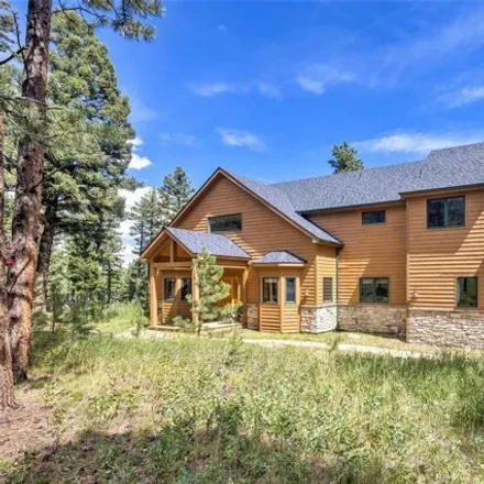 Buy this 4 bed house on 12886 Piano Meadows Drive in Jefferson County, CO 80433