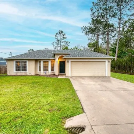 Buy this 4 bed house on 68 Kansas Path in Palm Coast, FL 32164
