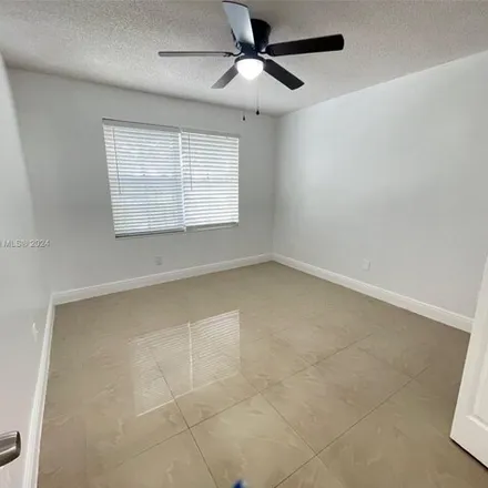 Rent this 2 bed condo on 9635 Northwest 1st Court in Pembroke Pines, FL 33024