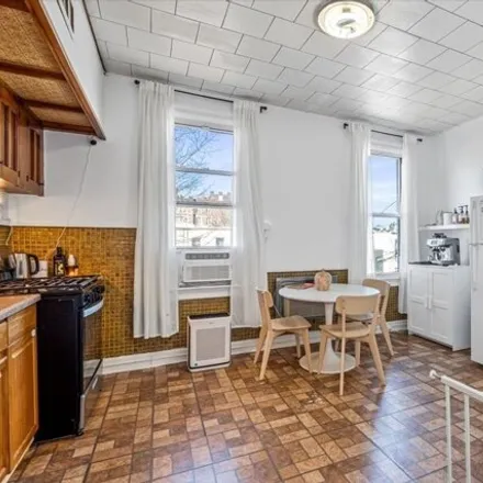 Image 8 - 71-12 70th Street, New York, NY 11385, USA - House for sale