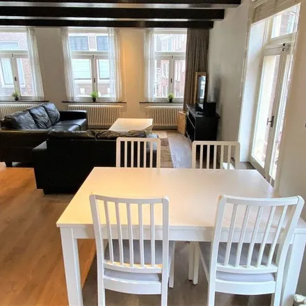 Rent this 3 bed apartment on Crêpes Restaurant in Haringpakkerssteeg 6, 1012 LR Amsterdam