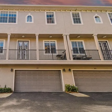 Rent this 2 bed townhouse on 2617 Espana Court in Tampa, FL 33609