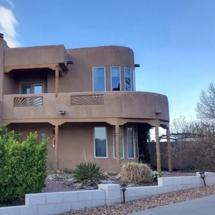 Buy this 4 bed house on Double Diamond Circle Southeast in Rio Rancho, NM 87124