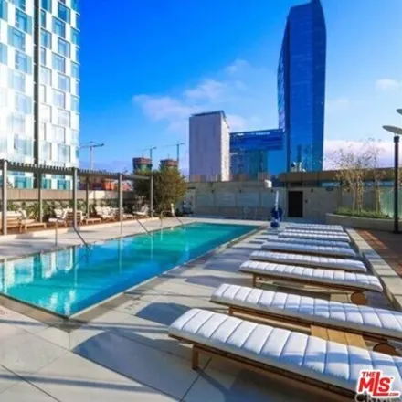 Buy this 1 bed condo on Metropolis Residential Tower I in Harbor Freeway, Los Angeles