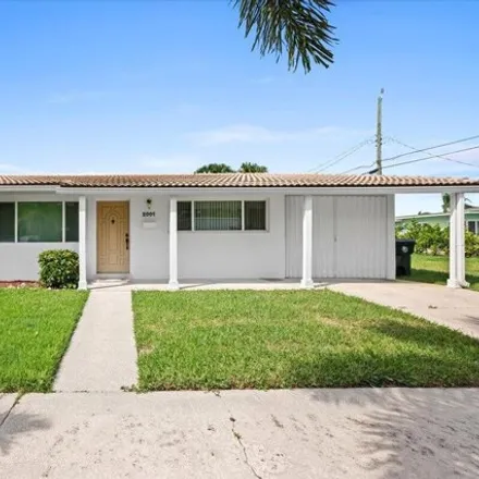 Rent this 3 bed house on 2023 North Lakeside Drive in Lake Worth Beach, FL 33460